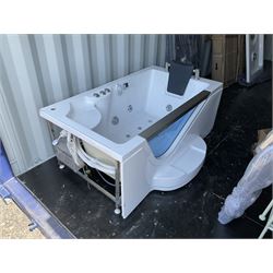 Jacuzzi bath with surround glass panels, sliding doors and ceiling mounted shower head panel - THIS LOT IS TO BE COLLECTED BY APPOINTMENT FROM DUGGLEBY STORAGE, GREAT HILL, EASTFIELD, SCARBOROUGH, YO11 3TX