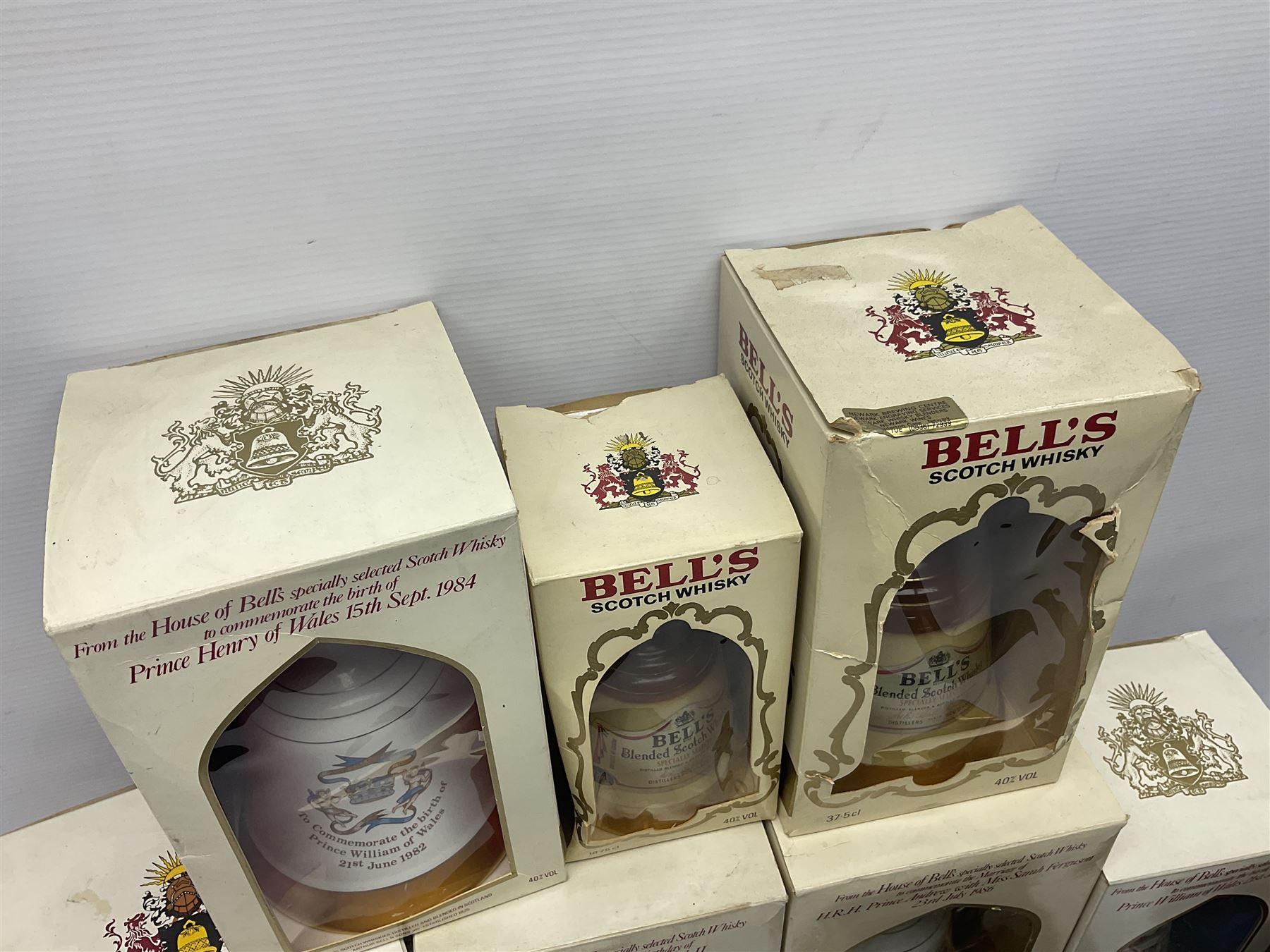 Bells, Scotch whisky, in eight Wade ceramic decanters, including Christmas 1992, Queens 60th birthday, Birth of Prince William etc, various contents and proof   