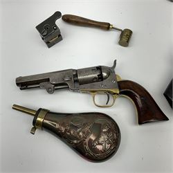 Colt model 1849 percussion six-shot pocket revolver, the 10cm octagonal barrel inscribed 'Address Col Saml Colt New York US America' with underbarrel rammer, cylinder engraved with stagecoach scene, most parts with matching serial no.258742 but cylinder numbered 58742, brass trigger guard and backstrap and tw0-piece walnut grips L25cm; with modern powder flask, bullet maker, measure and leather holster