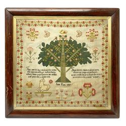 Victorian sampler, by Jane Kay, dated 1897, worked with with central fruiting tree surmounted by two birds, and surrounded by  flowers, urns, lamb, and religious verse detailed 'That awful day will surely come. The appointed hour makes haste. When I must stand before my judge. And pass the solemn test. Though lovely chief of all my joys. Thou sovereign of my heart. Now could I bear to hear thy voice pronounce the sound, ''Depart.', within a strawberry vine border, in a simulated rosewood frame, overall H68cm L70cm