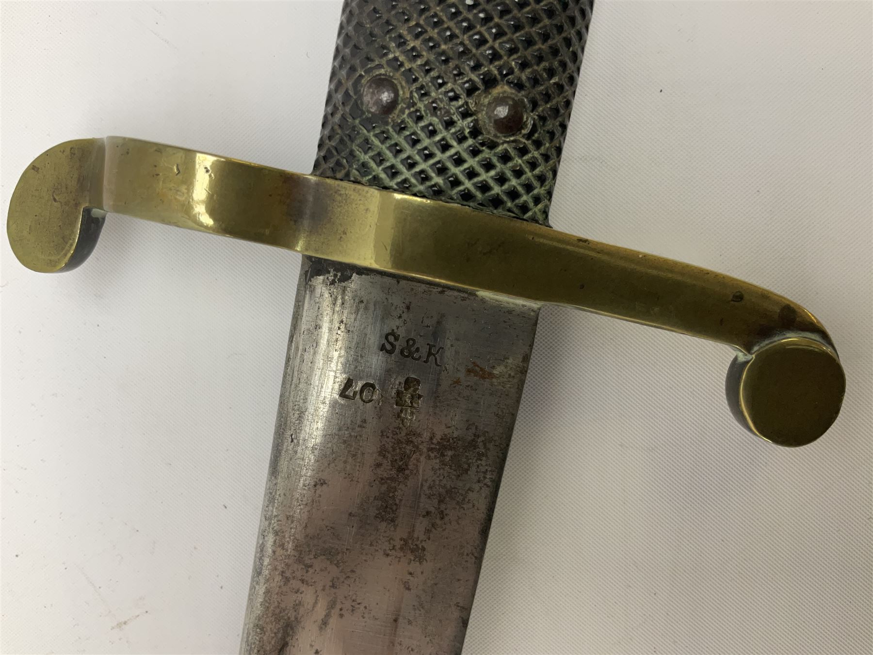 British 1855 pattern 'Sappers & Miners' Lancaster sword bayonet as issued to Medical Corps, the 62cm steel blade marked S&K with various numbers; in brass mounted leather scabbard numbered 1176