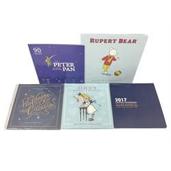 United Kingdom, Isle of Man and Bailiwick of Guernsey fifty pence coins including 'Rupert Bear', 'Alice's Adventures in Wonderland' etc, housed in card folders (5)