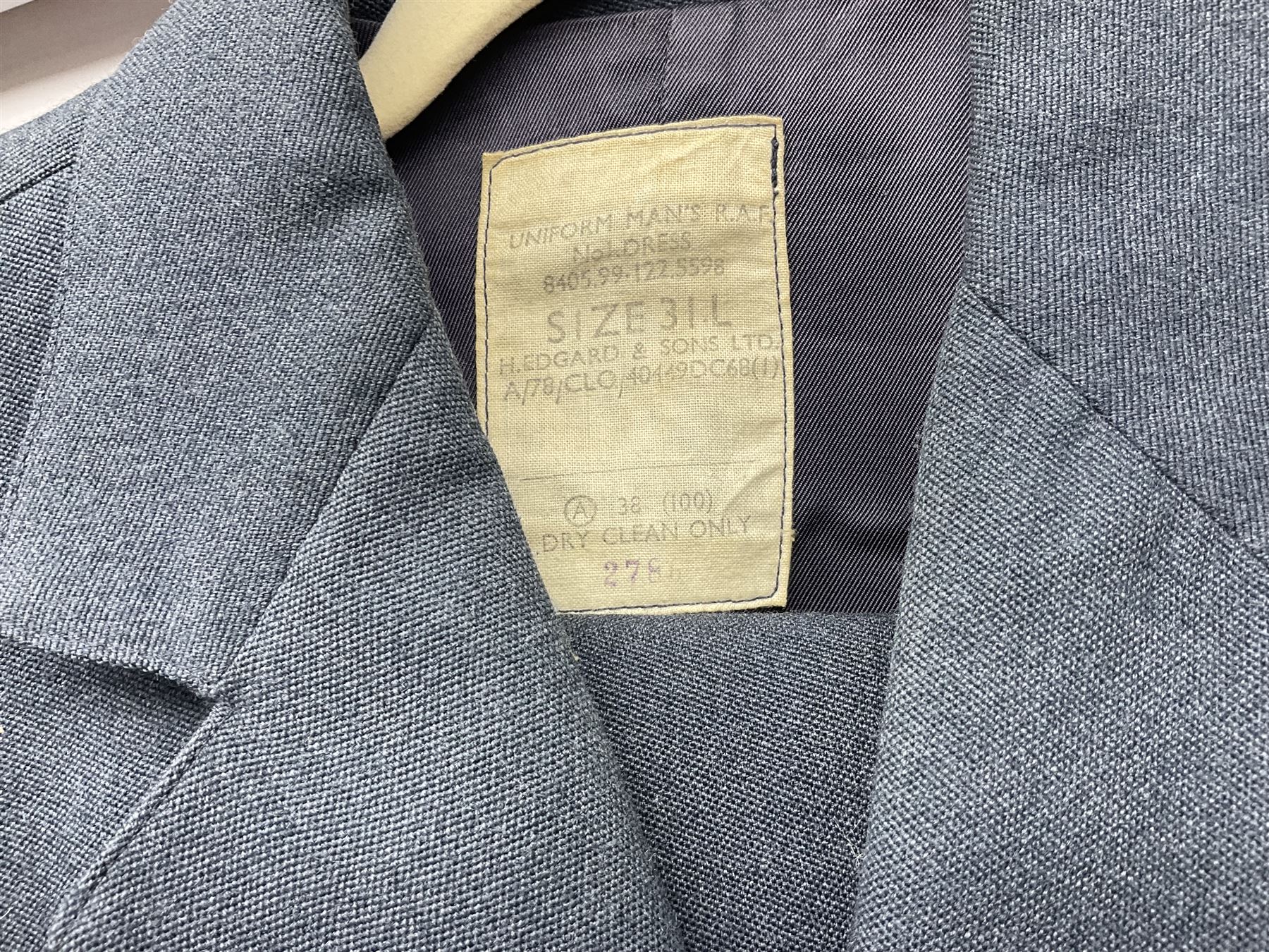 Two post-WWII British Army No.2 Dress tunics, one with Green Howards buttons; army shirt dated 1951; Royal Fleet Auxilliary jacket with trousers; three RAF/WAAF uniforms and RAF Greatcoat; and three canvas/webbing bags, two dated 1943 & 1945