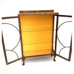 Early 20th century walnut display cabinet, two doors enclosing two glazed shelves, cabriole feet