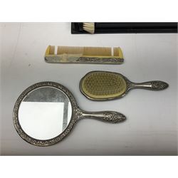 Ebony dressing table set, together with continental porcelain dressing table set; and another (3)