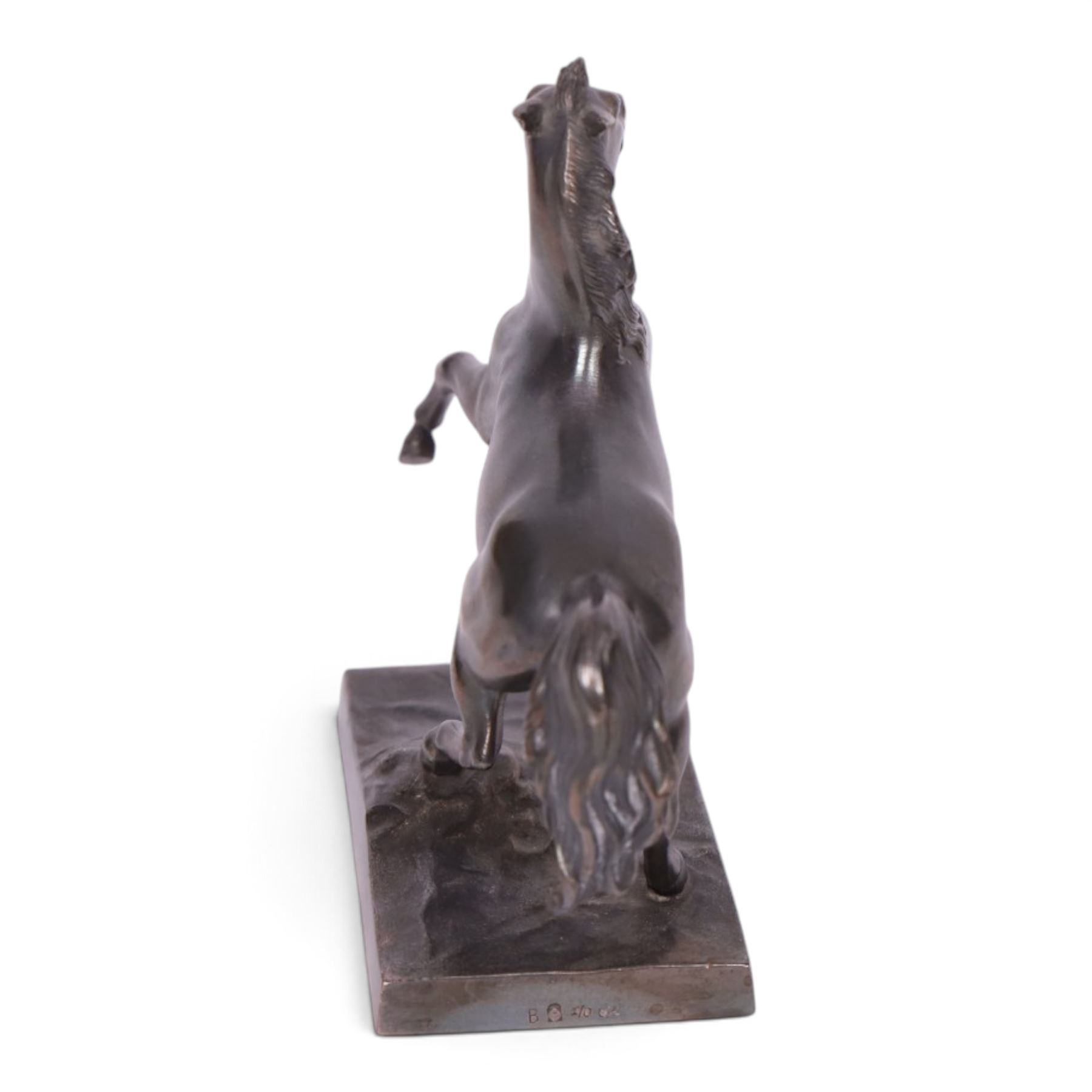 Early 20th century WMF rearing stallion in the manner of Fredrick Wilhelm Wolff, with makers mark to base, H12cm 