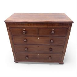 Early 19th century mahogany chest of drawers, the rectangular top with boxwood line inlay above two short and three long graduating drawers, each with turned wooden knobs and bone escutcheons, flanked by fluted uprights with diamond inlaid panels, on shaped bracket feet