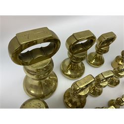 Graduated set of eight brass bell weights, together with a set of five graduating weights (13)
