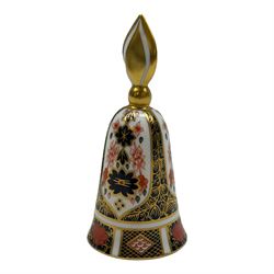 Collection of fifteen Royal Crown Derby thimbles upon an ebonised display stand, together with Royal Crown Derby candle snuffer in Imari pattern 1128
