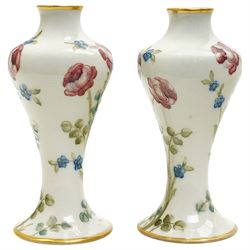 William Moorcroft for James Macintyre & Co, pair of small shouldered vases decorated with blossoming roses, burslem brown mark and Moorcroft signature to base, H15cm (2)