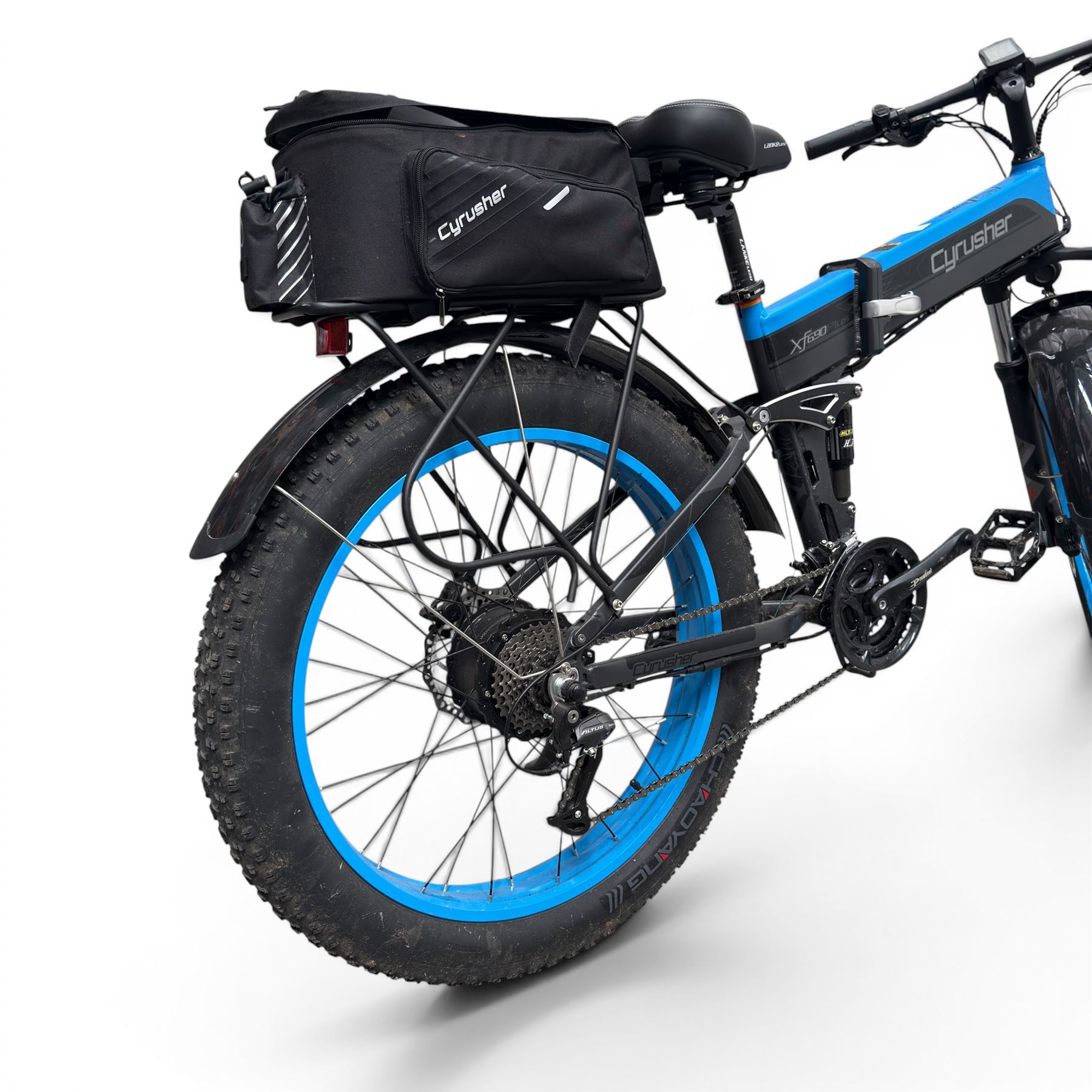 Cyrusher XF690 Plus - electric fat tyre bicycle, 250W model, with suspension forks, disc brakes, rear pannier bag and blue and black finish.