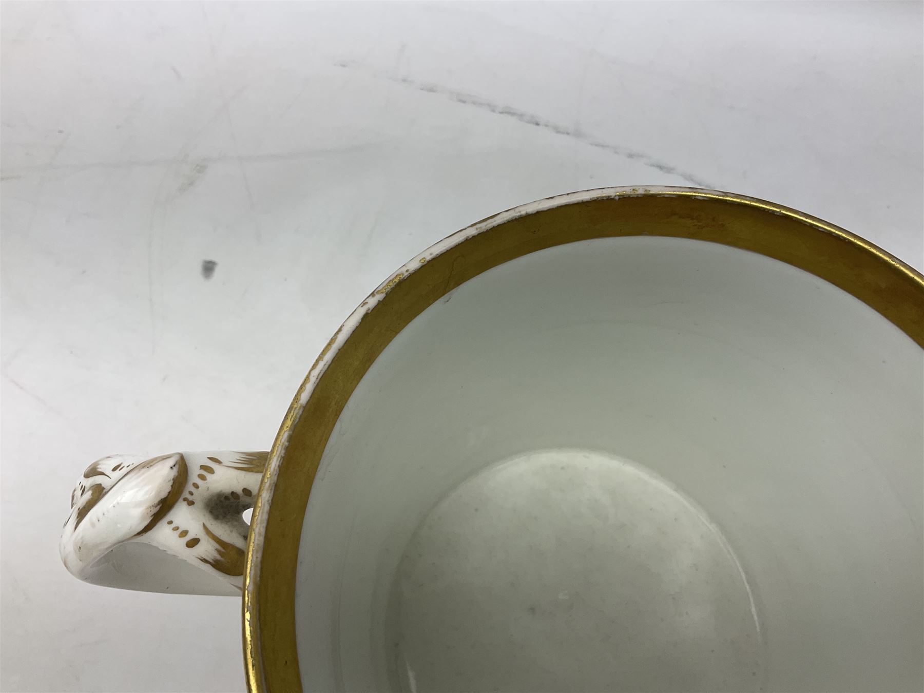 19th century loving cup, with decorated with religious iconography, a gilt rim and writing 'Henry Whittirld Wolverhampton, Whoever drinketh of the water shall thirst again but who soever drinketh of the water that i shall give him shall never thirst',  H14cm