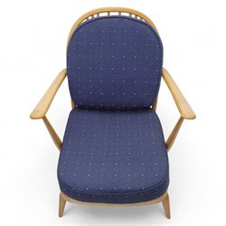 Ercol - Model '203', pair of easy chairs, with blue upholstered cushions and additional orange covers, with looped backrest and shaped spindles, outward swept arms, drop in seat frame
