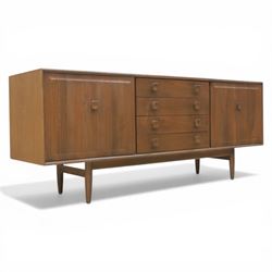 Ensign - Mid-20th century elm sideboard, with a central bank of four drawers, flanked by c...