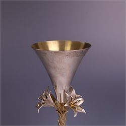 Modern limited edition silver goblet, 'made by order the provost and charter of Blackburn to commemorate the fiftieth anniversary of the cathedral in 1976 and its consecration in 1977' designed by Hector Miller for Aurum, the plain fluted cup, upon a stem of three lillies with parcel gilt highlihts and upon a circular foot, no. 2/750, hallmarked Hector Miller, London 1977, H17cm, boxed with certificate of authenticity