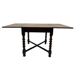 Early 20th century oak barley twist extending table, two fold-over leaves with pull-out stays, spiral turned supports joined by x-stretchers