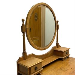 Late 19th century oak wardrobe, enclosed by rectangular bevelled mirror glazed door, fitted with single drawer to base (W118cm, H198cm, D42cm); together with a matching dressing chest, circular bevelled mirror over two short and two long drawers (W92cm, H159cm, D48cm)