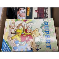 Collection of Rupert Bear annuals together with, two Corgi models, postcards and other ephemera 