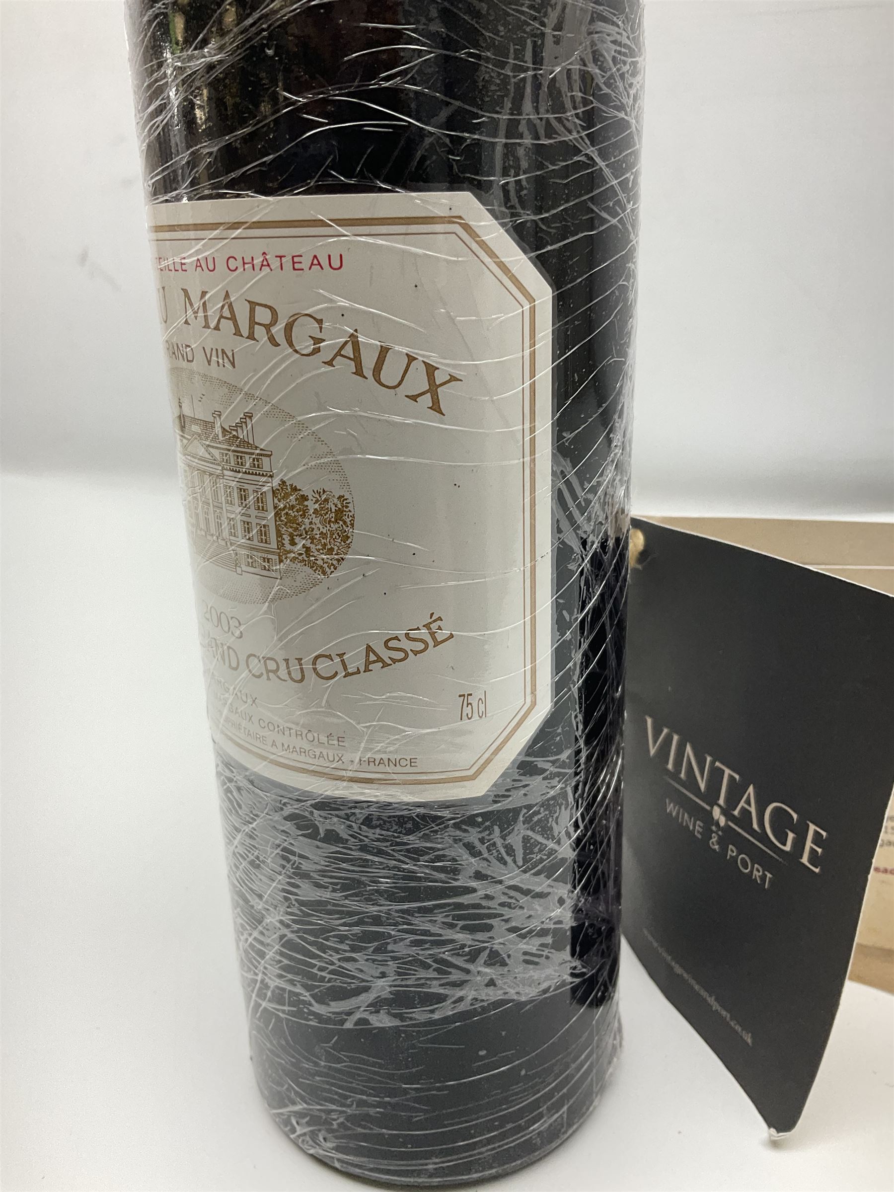 Chateau Margaux, 2003, Margaux, unknown content and proof, this bottle has depressed cork and signs of seepage
