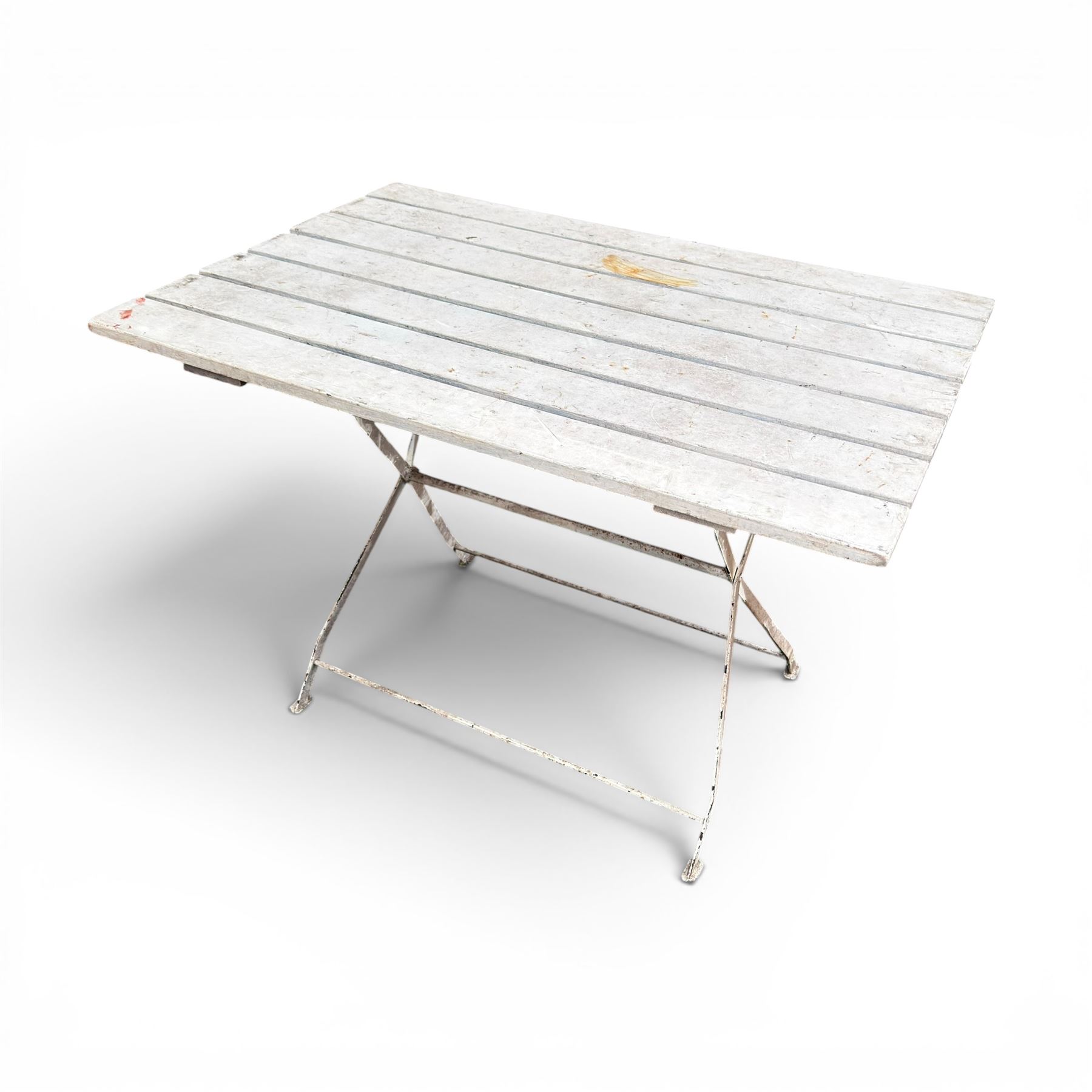 Wrought metal folding garden table, with painted wood plank top; and four matching folding chairs