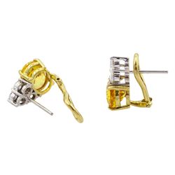 Pair of 18ct white and yellow gold round brilliant cut diamond and oval cut yellow sapphire earrings, total sapphire weight approx 5.40 carat, total diamond weight approx 0.65 carat