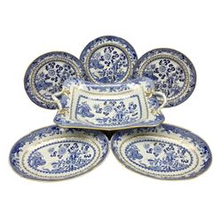 Early 19th century Spode dessert set, circa 1805-1830, blue and white transfer printed in the Grasshopper pattern, comprising comport of oblong form with twin naturalistically modelled branch handles, two oval dishes, and six plates, each with blue or green printed mark beneath, including handles comport H11.5cm W34cm, oval dishes W26.5cm, plates D20.5cm