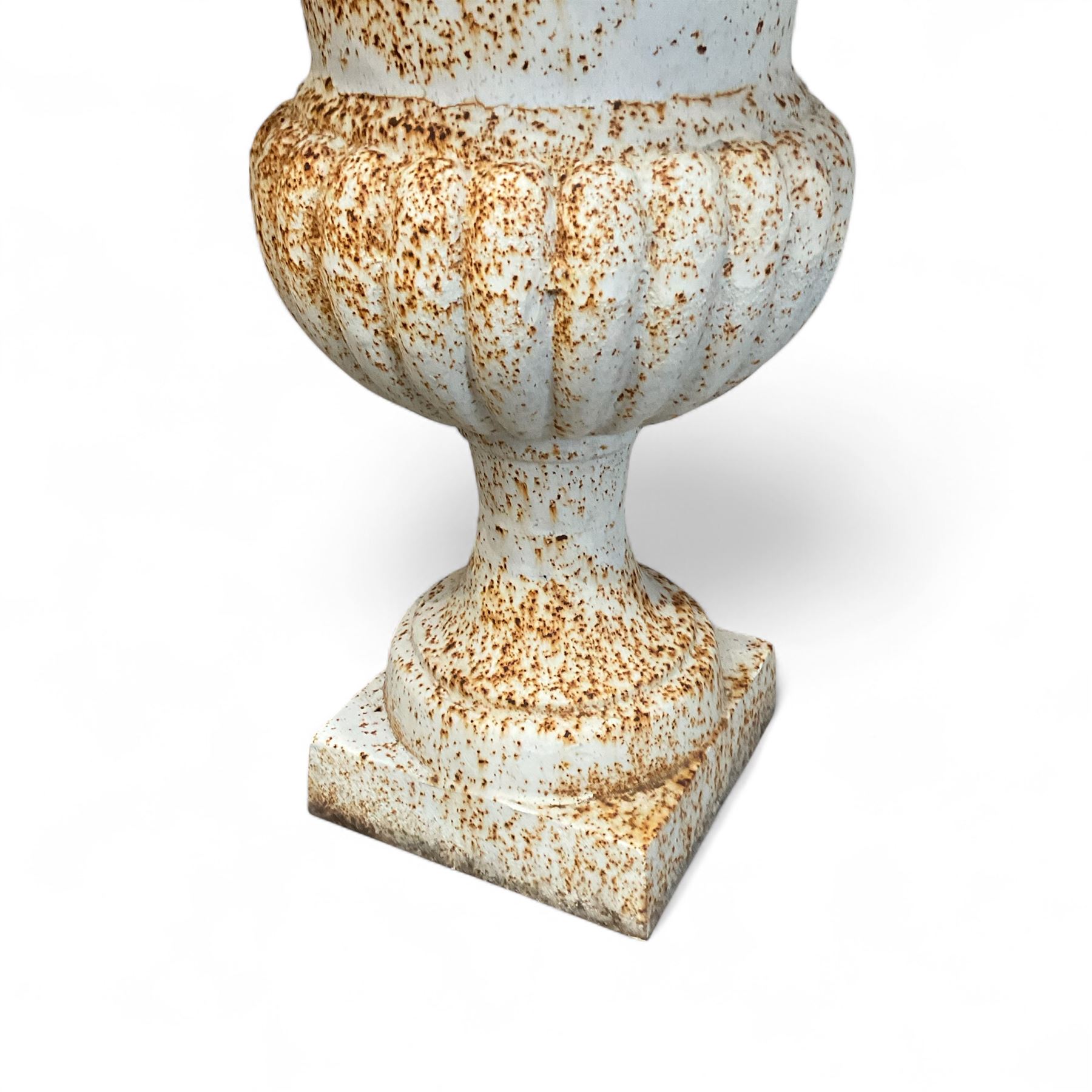 Pair of Victorian design painted cast iron garden urns, egg and dart rim, tapering column on pedestal base