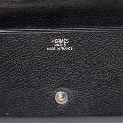 Hermès - black grained leather gusseted card holder, with press-stud fastening and concertina interior, stamped Hermès Paris Made in France, with original box