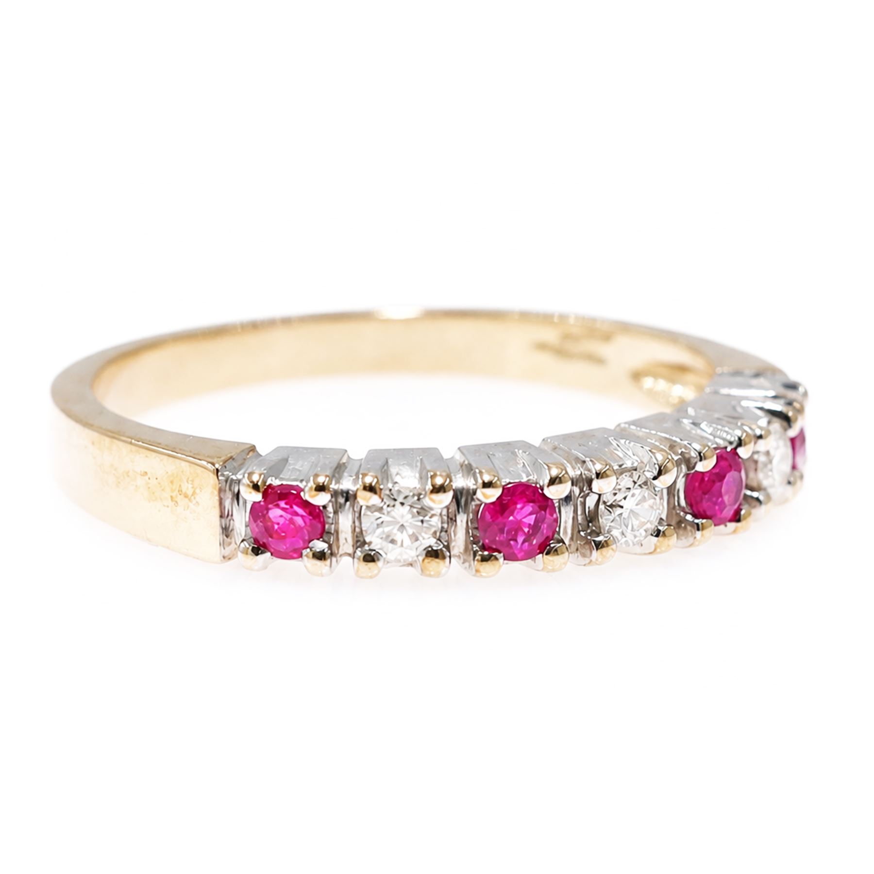 9ct gold ruby and diamond seven stone half eternity ring, alternate set with round brilliant cut diamonds and rubies, hallmarked, total diamond weight 0.15 carat
