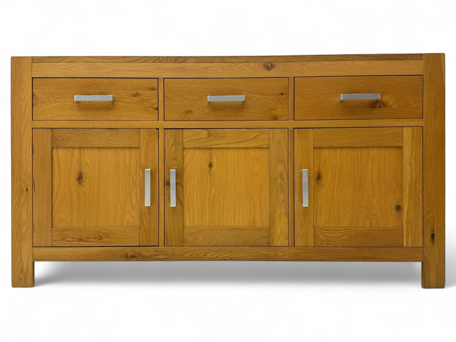 Light oak sideboard, fitted with three drawers and three cupboards, metal handles