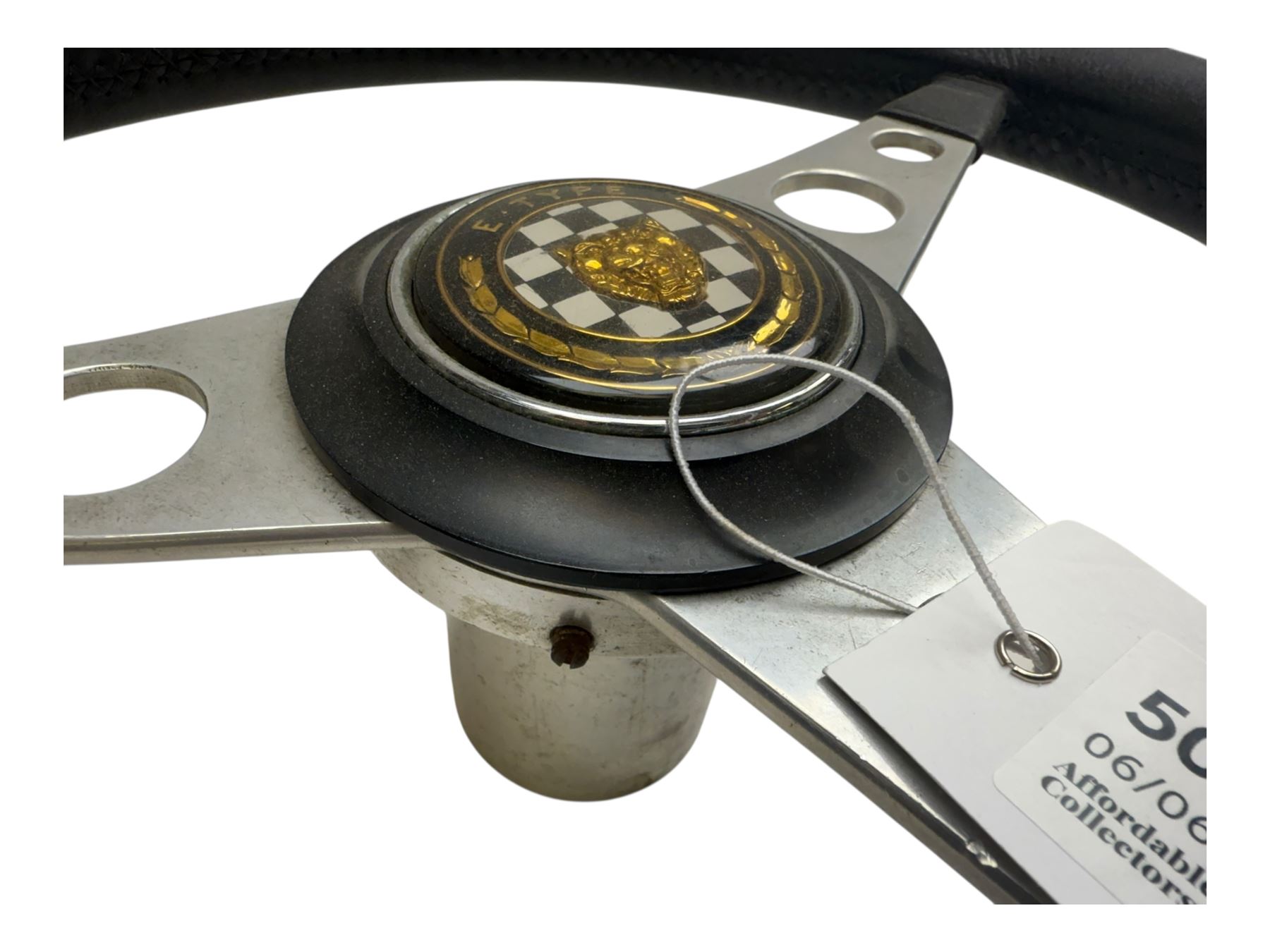 Steering wheel with E-Type Jaguar badge, AA badge, RAC badge and Lotus gearstick top