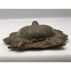 Carved pine mask of the sun, probably late 17th/early 18th century, originally a cresting, bearing Christie's lot labels, D20cm

Provenance 
Lot 161, Christopher Howe - The First Twenty Years, Christie's. 24th March 2004
