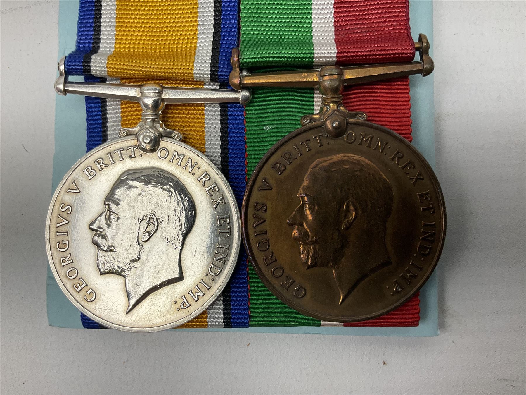 WW1 father and son medal groups comprising British War Medal and Mercantile Marine Medal awarded to Captain Allanson Hick and British War medal, 1914-15 Star and Victory Medal awarded to 1198 Pte. Allanson Hick E. York. R. with biographical information. N.B. Allanson Hick Jnr. of Hull was a celebrated architect and renowned marine artist being a founder member of the Society of Marine Artists (RSMA).