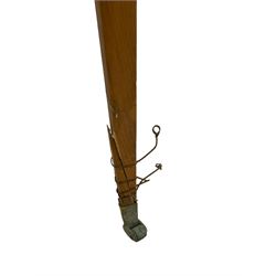 20th century pine architectural collector's cabinet on stand, projecting dentil cornice over various compartments, central recessed arch with turned pillar supports and sloped arch pediment, fitted with four cupboards, false brickwork uprights to front and corners, central hidden drawer revealing cube work surface, lower moulded plinth, the stand with foliate carved mouldings, on six square tapering supports with brass castors