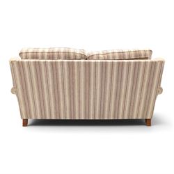 Parker Knoll - contemporary 'Henley' lounge suite comprising grande two seat sofa and wingback armchair, traditional wing shape over rolled arms and turned feet, upholstered in striped fabric