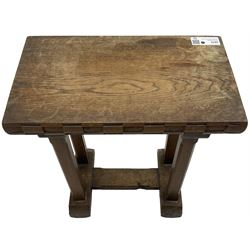 Yorkshire oak - small oak occasional table, rectangular top with carved checkered edge, on four stop chamfered pillar supports, sledge feet united by stretchers, carved with butterfly signature 