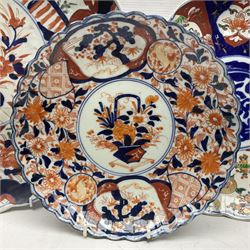Three Japanese Imari chargers with scalloped edges, largest D38cm