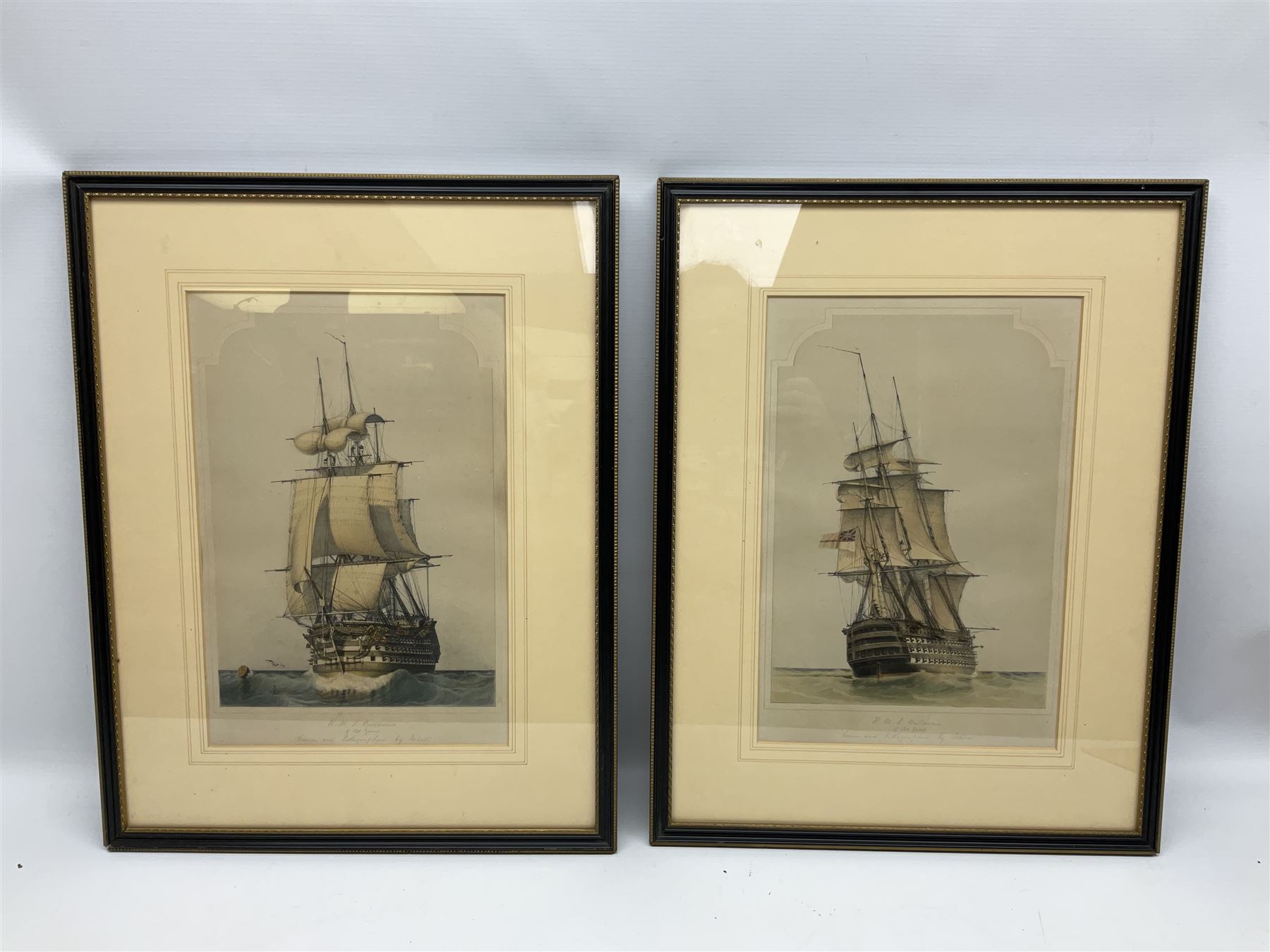 By and after John Ward of Hull (British 1798-1849): 'H M S Britannia of 120 Guns', pair lithographs with hand-colouring signed and titled in pencil 38cm x 25cm (2)