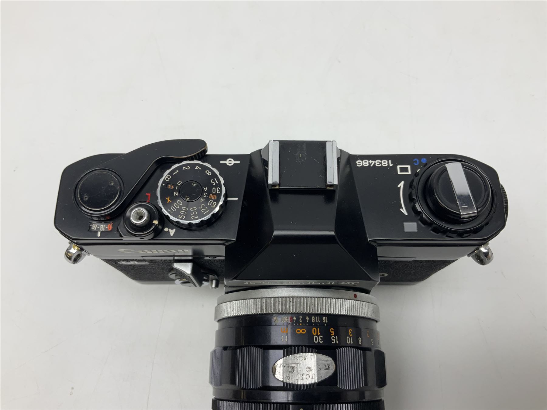 Canon QL Pellix camera body, serial no. 807468, with 'Canon FL 58mm 1:1.2' lens, serial no. 60185