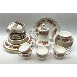 Colclough tea wares, comprising teapot, milk jug, two open sucriers, six teacups, seven saucers, one larger cup and saucer, cake plate, five plates, four smaller plates, seven side plates, and eight bowls, with floral decoration. 