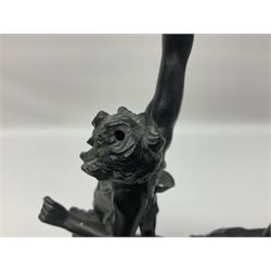Pair of spelter figures, Le Force and Le Pouvoir, modeled as figures standing on lions, arms held aloft, H51cm 