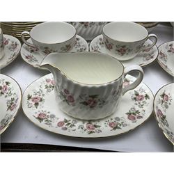 Minton Spring Bouquet pattern dinner and tea service, comprising dinner plates, twin handled tureens with covers, meat platter, teapot, milk jug, sugar bowl with cover, tea cups and saucers, bowls, cake plate, side plates, dessert plates, etc all with printed mark beneath (82)