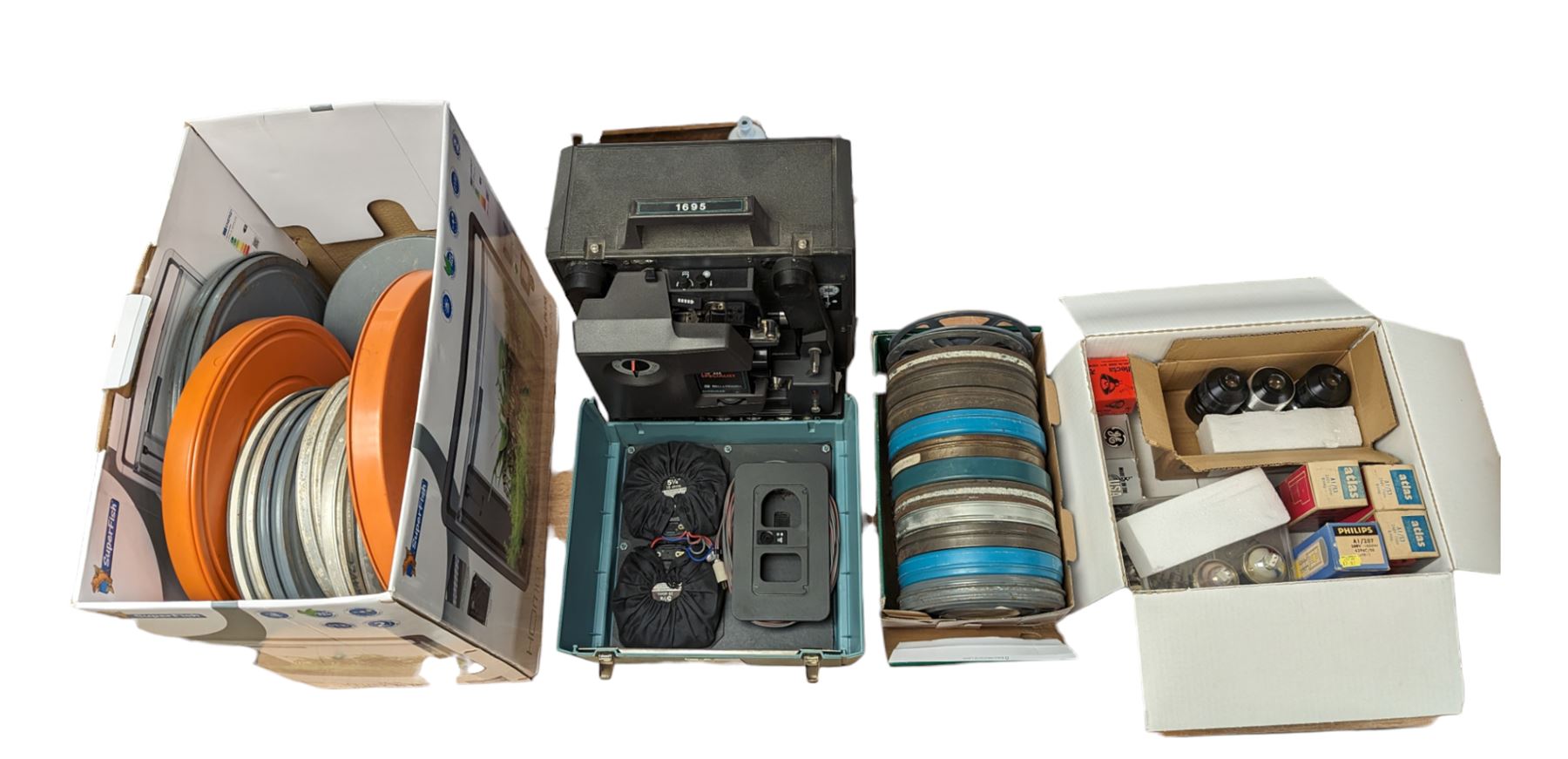 Bell & Howell TQ III 16mm film projector, together with lenses and spare projector lamps and a quantity of 16mm film reels, including Kellogg advert, Tex Avery cartoon and other film reels
