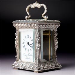 Chas Frodsham -  Miniature carriage clock with white dial and platform lever escapement in cast silver case with caryatid columns and bevelled glass panels H10cm  London assay No.0468