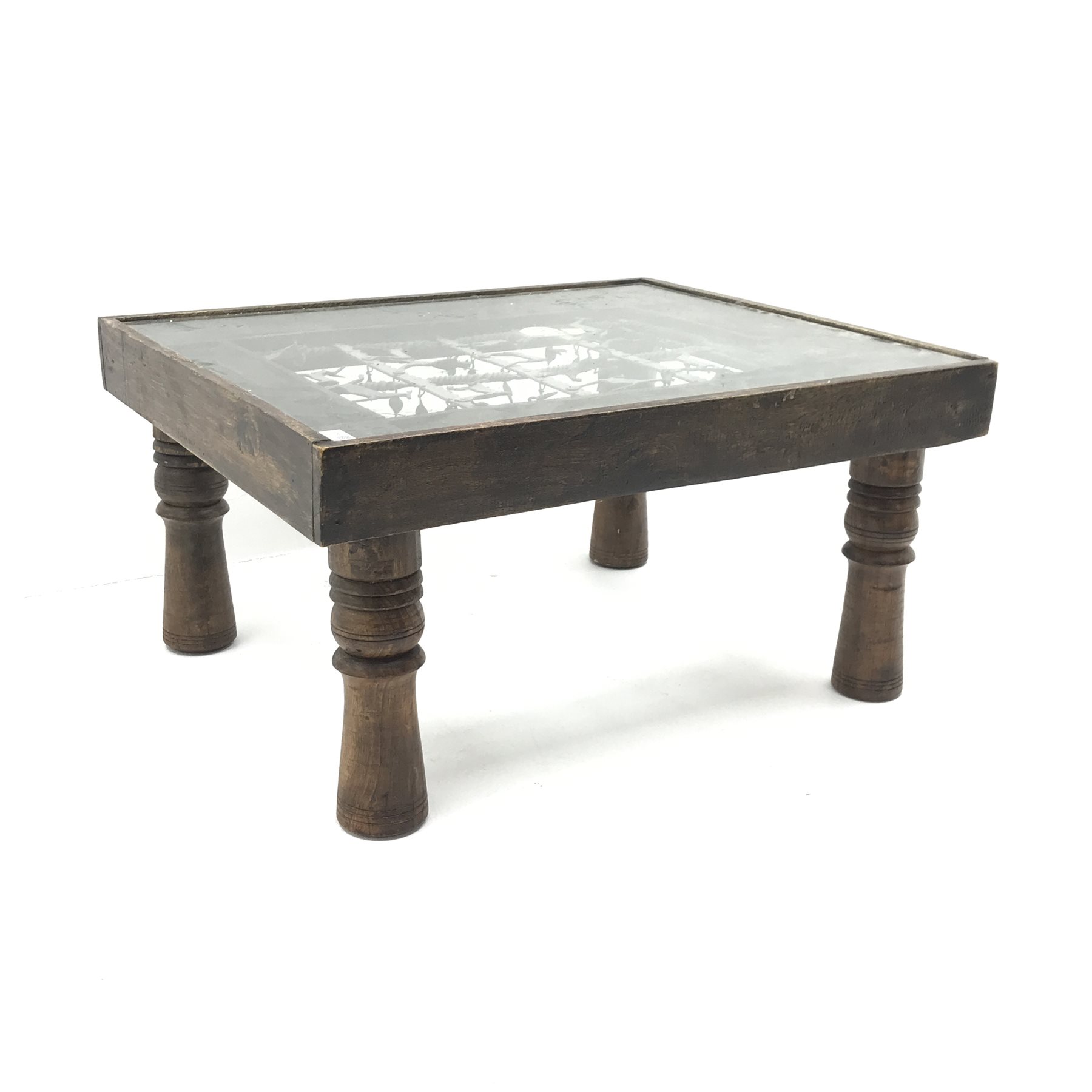Hardwood coffee table with ironwork inset and glass top, 85cm x 73cm