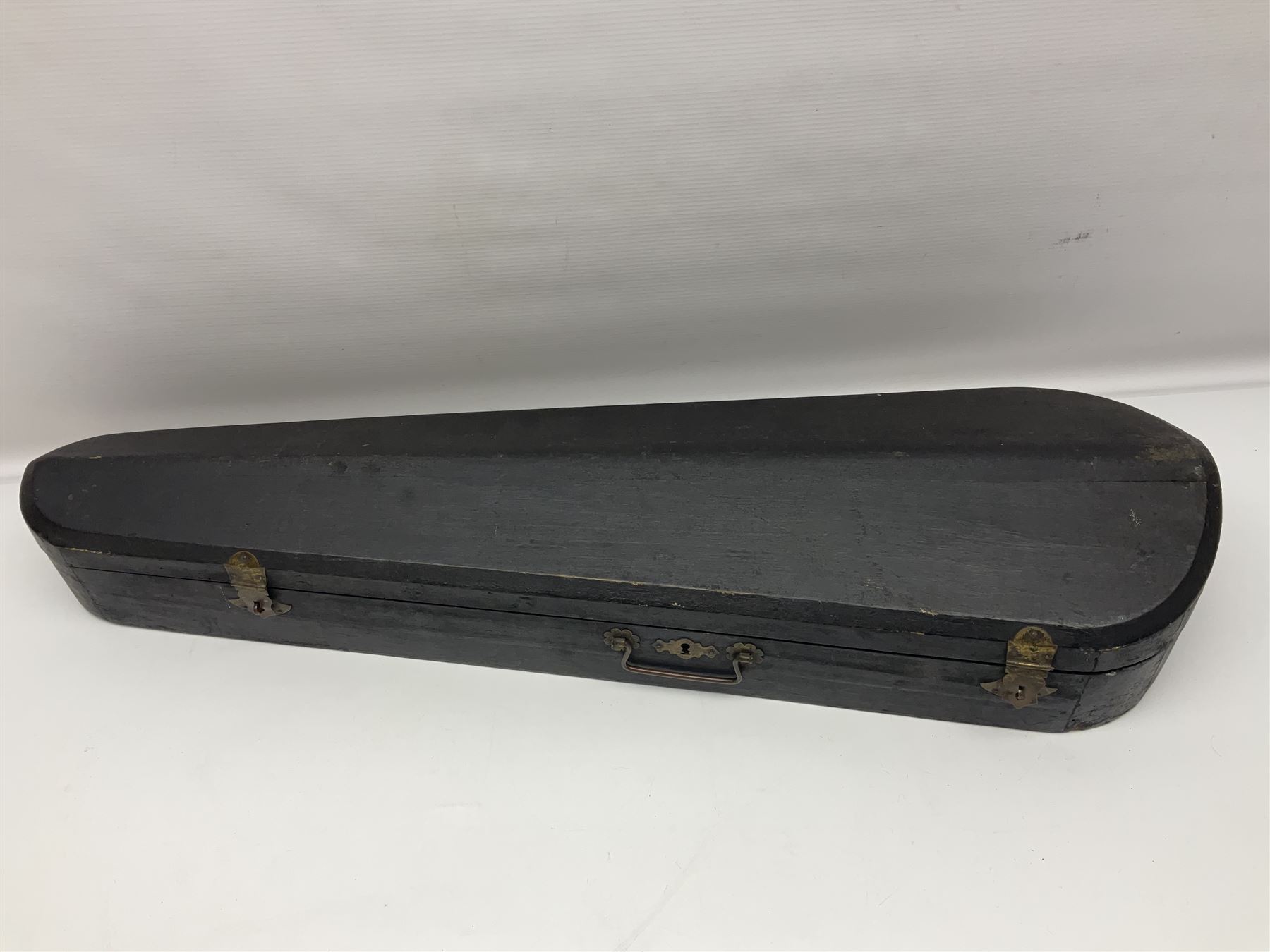 German violin c1890 with 36cm two-piece maple back and ribs and spruce top; bears label 'Antonius Stradivarius Cremona Faciebat Anno 1729' L59.5cm overall; in ebonised wooden 'coffin' case; and two German violins c1890 for completion - one bearing a Stradivarius label, the other a Ruggeri label; both in carrying cases (3)