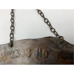 Copper wall hanging sign in the form of a whale, stamped 'whale oil sold here', L28cm