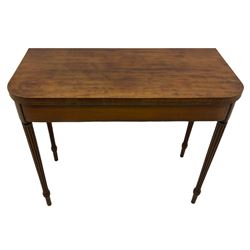 Early 19th century tea table, rectangular fold-over top with rounded corners, the frieze and sides inlaid with satinwood panels, double gate-leg action base, on reeded supports 