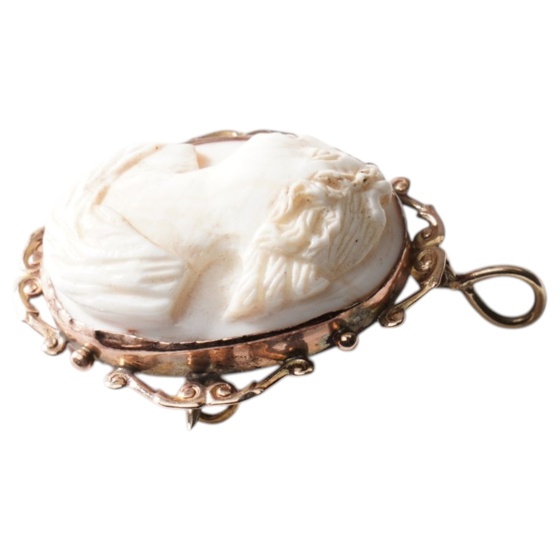 Early 20th century cameo brooch carved as a female bust, in ornate rose gold mount 