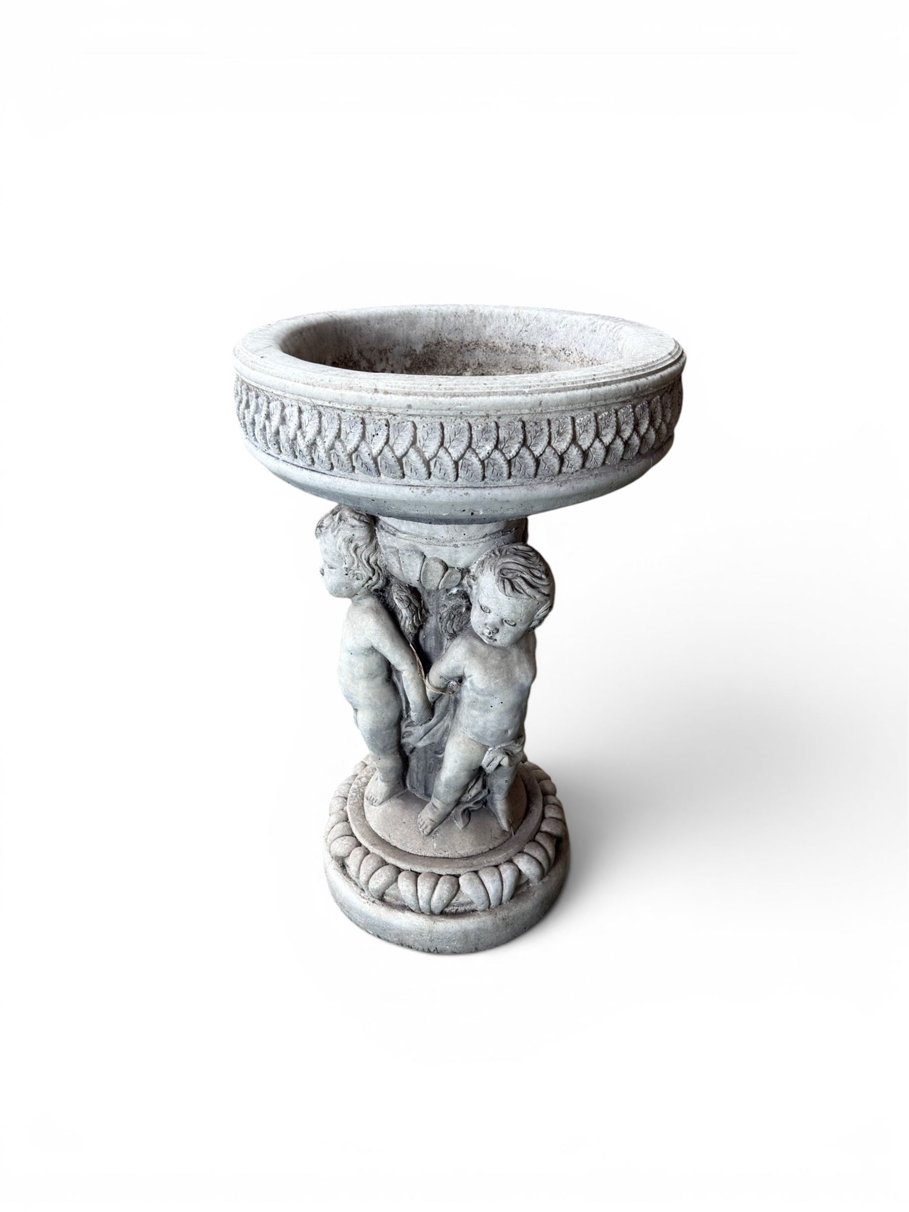 Cast stone cherub bird bath, circular removable top raised on three cherubs with ornate detailing